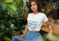 Girl wearing T-Shirt with Knot Mockup Generator
